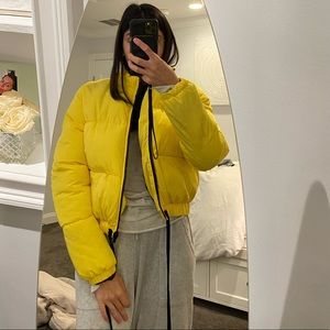 Yellow puffer jacket